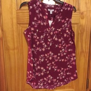Sleeveless button down floral top with pockets
